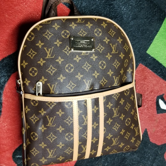 Louis Vuitton book bag - Picture 1 of 8